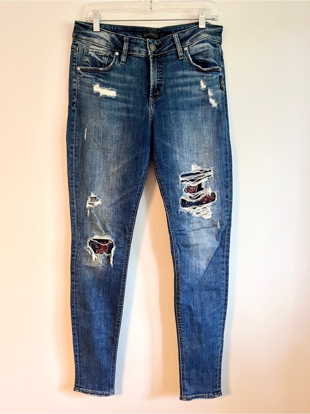 Silver Jeans Blue Distressed Skinny Jeans with Floral Patch Insets